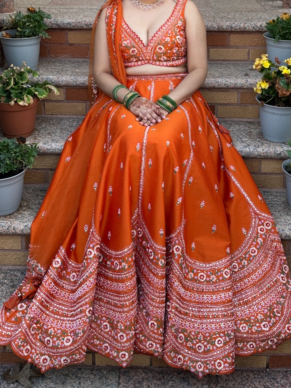 Vibrant Orange Embellished Lehenga Choli